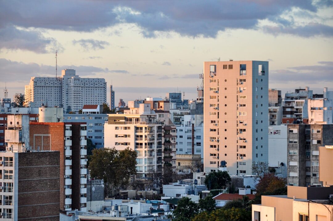 Montevideo city skyline along the coast at sunset