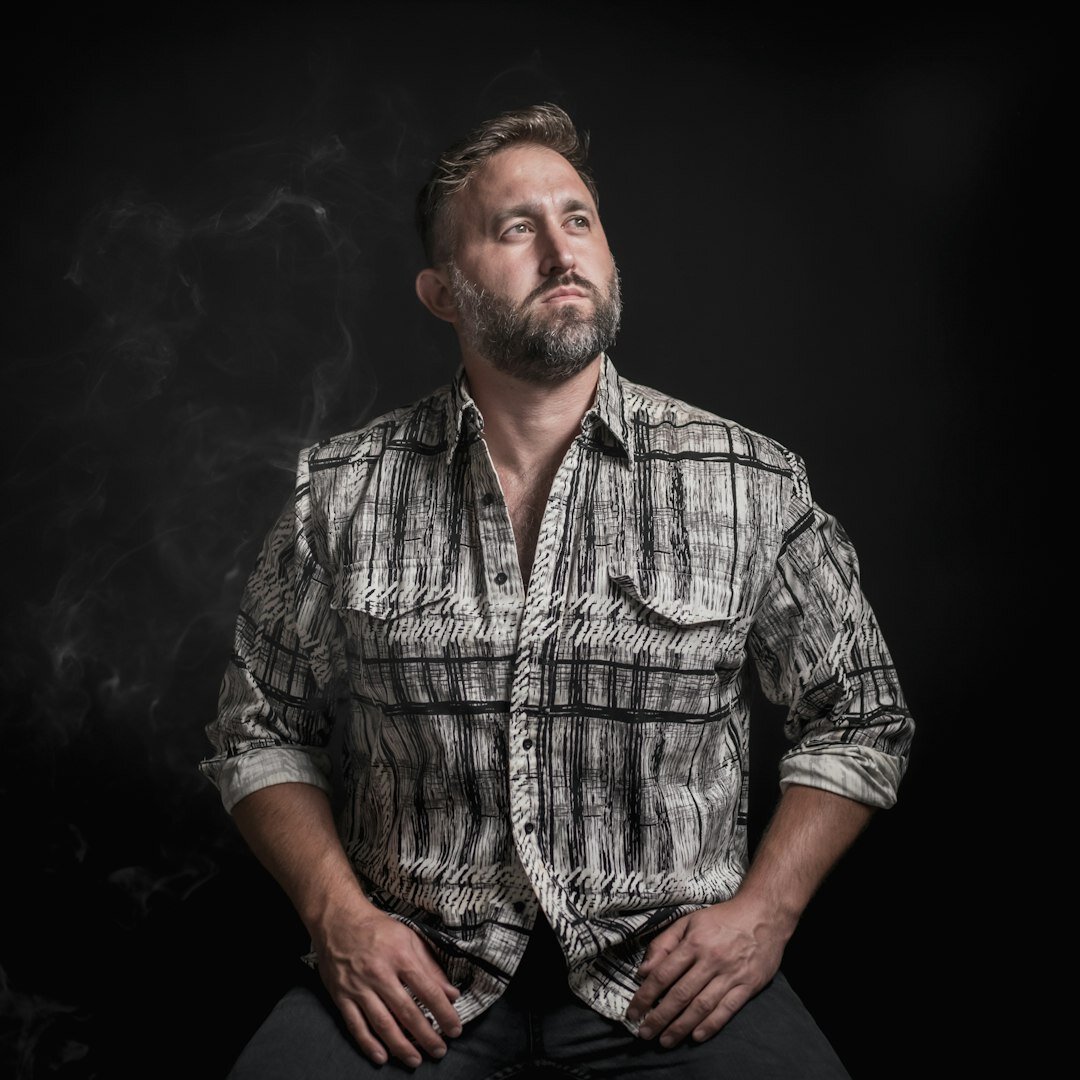 Studio portrait of a male entertainment reporter