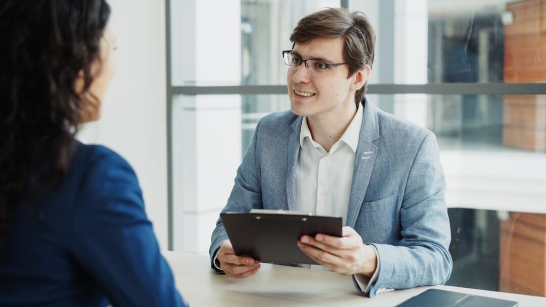 man smiling in interview